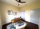 Home office featuring a wooden desk, comfortable chair, and natural light at 6393 Pinehurst Dr, Spring Hill, FL 34606