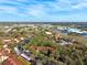 Expansive aerial view featuring well-maintained condo complex and the lush, green surrounding community at 7650 Forest Trl # 7, Port Richey, FL 34668
