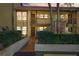 Charming condo featuring stone accents and a tiled roof, complemented by lush landscaping and a private entrance at 7650 Forest Trl # 7, Port Richey, FL 34668