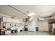 Clean garage with storage and tools along the walls at 8373 Maybelle Dr, Weeki Wachee, FL 34613