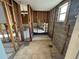 Bathroom renovation featuring tiled floors, exposed plumbing and studs for a contemporary look at 8607 Longboat Ln, Hudson, FL 34667