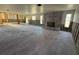 Bright living room with brick fireplace ready for remodel and providing a blank canvas for customization at 8607 Longboat Ln, Hudson, FL 34667