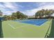 Well maintained tennis courts offer a great outdoor amenity at 9634 Green Needle Dr, New Port Richey, FL 34655