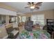 Open-concept living space featuring a kitchen, breakfast nook, and living area at 9713 Sweeping View Dr, New Port Richey, FL 34655