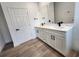 Bathroom featuring double sink vanity with modern fixtures at 1032 Concert Ave, Spring Hill, FL 34609
