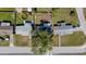 Aerial view of the property, showing the layout of the house and surrounding neighborhood at 10841 Scenic Dr, Port Richey, FL 34668