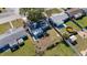 Aerial of the property showing surrounding yard and neighborhood featuring a fenced backyard at 10841 Scenic Dr, Port Richey, FL 34668