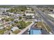 Wide aerial view showing the location of the property with nearby street and amenities at 10841 Scenic Dr, Port Richey, FL 34668