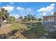 Large backyard with chainlink fence and spacious land at 10841 Scenic Dr, Port Richey, FL 34668