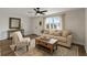 Inviting living room with comfortable seating, natural light, and contemporary decor at 10841 Scenic Dr, Port Richey, FL 34668