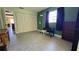 The bedroom includes a closet, a window, and tile flooring at 11817 Bayonet Ln, New Port Richey, FL 34654