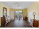 Bright bedroom with sliding glass doors to the patio, enhancing natural light and indoor-outdoor flow at 13140 Maycrest Ave, Weeki Wachee, FL 34614