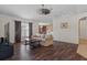 Spacious living room with laminate flooring, neutral paint, and plenty of natural light at 13140 Maycrest Ave, Weeki Wachee, FL 34614