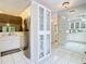 Bright kitchen showcases stainless steel appliances and white cabinetry, creating a modern and functional cooking space at 13227 Molitor Ct, Hudson, FL 34669