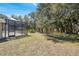 Spacious backyard with screened in lanai at 18251 East Rd, Hudson, FL 34667