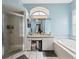 Bathroom features a separate shower, a jetted tub, and a vanity with plenty of counter space at 18251 East Rd, Hudson, FL 34667