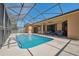 View of the private pool, backyard and surrounding nature views at 18251 East Rd, Hudson, FL 34667
