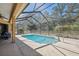 Enjoy the shade on the patio or soak up the sun by the pool with the screened enclosure at 18251 East Rd, Hudson, FL 34667