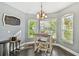 Cozy breakfast nook featuring bright windows and decorative lighting at 215 Arbor Woods Cir, Oldsmar, FL 34677