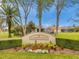 Attractive community entrance sign at Cameron's Pointe, featuring well-maintained landscaping and a welcoming ambiance at 2336 Edelweiss Loop, Trinity, FL 34655