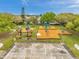 Elevated view of the community park featuring a playground, picnic area, and basketball court in a Gathering-friendly neighborhood at 2336 Edelweiss Loop, Trinity, FL 34655