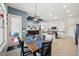 Open concept dining area flows seamlessly into the kitchen and living spaces at 2336 Edelweiss Loop, Trinity, FL 34655