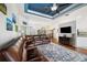 Spacious living room with wood floors, a blue ceiling, and lots of natural light at 2336 Edelweiss Loop, Trinity, FL 34655