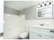 Clean bathroom with a tub, toilet, and vanity, offering a refreshing and functional space at 2464 Australia E Way # 46, Clearwater, FL 33763