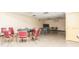 Comfortable game room featuring tables and seating, perfect for leisure activities and socializing at 2464 Australia E Way # 46, Clearwater, FL 33763