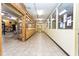 Clean and bright hallway featuring tile floors, ample lighting, and convenient access to various amenities at 2464 Australia E Way # 46, Clearwater, FL 33763