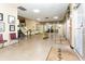 Spacious lobby area featuring tiled floors, comfortable seating, and clear wayfinding signage to the reception desk at 2464 Australia E Way # 46, Clearwater, FL 33763