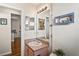 Bathroom with a light wood vanity, large mirror, and coastal decorations at 3042 Gianna Way, Land O Lakes, FL 34638