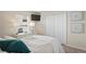 Well-lit bedroom with a large window, dresser, and a comfortable bed at 3042 Gianna Way, Land O Lakes, FL 34638