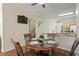 Dining nook with table set for four and close proximity to the kitchen and stairs at 3042 Gianna Way, Land O Lakes, FL 34638