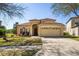 Charming two-story home with a well-manicured lawn and an attached two-car garage at 3042 Gianna Way, Land O Lakes, FL 34638