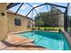 A screened pool offers a refreshing escape with clear blue water and a private, enclosed setting at 3042 Gianna Way, Land O Lakes, FL 34638