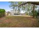 The property includes a large, shady backyard, perfect for outdoor activities and enjoying nature at 3209 Kismet Ct, New Port Richey, FL 34655