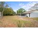This home boasts a well-maintained exterior and a generous yard, perfect for outdoor enjoyment at 3209 Kismet Ct, New Port Richey, FL 34655