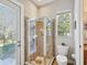 New and stylish bathroom with a modern tiled walk-in shower at 3733 Wiregrass Rd, New Port Richey, FL 34655