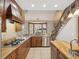 Well-equipped kitchen with granite countertops, stainless steel appliances, and ample cabinet space at 3733 Wiregrass Rd, New Port Richey, FL 34655