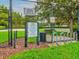 Longleaf ball courts with tennis, pickleball, basketball, and rules posted for residents at 3733 Wiregrass Rd, Trinity, FL 34655