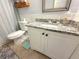 Bathroom featuring granite vanity and tiled floors at 4030 Grayton Dr, New Port Richey, FL 34652