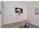 Cozy bedroom with a mounted TV, two closets and calming decor at 513 Meres Blvd, Tarpon Springs, FL 34689