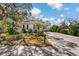 Charming single-story home with well-manicured lawn and inviting curb appeal at 513 Meres Blvd, Tarpon Springs, FL 34689