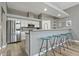 Bright kitchen with bar seating, stainless steel appliances, and sleek countertops at 513 Meres Blvd, Tarpon Springs, FL 34689