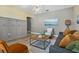Comfortable living room with stylish decor, wood-look flooring, and a decorative wall at 513 Meres Blvd, Tarpon Springs, FL 34689