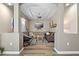 Comfortable living room with a large TV, stylish seating, and a modern ceiling fan at 513 Meres Blvd, Tarpon Springs, FL 34689