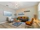 Stylish living room with modern furnishings, neutral color palette, and attractive decor at 513 Meres Blvd, Tarpon Springs, FL 34689