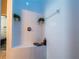 Bright shower featuring tiled walls, a built-in bench, and decorative hanging plants at 513 Meres Blvd, Tarpon Springs, FL 34689