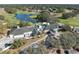 Lovely aerial view showcasing the clubhouse and its surrounding landscape at 5492 Legend Hills Ln, Spring Hill, FL 34609